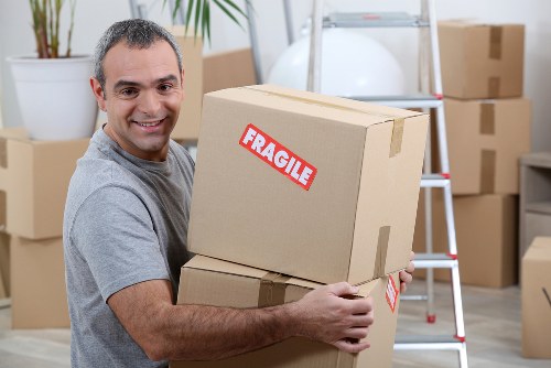 Removal van and moving team preparing a house move in Yiewsley