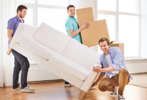 Local removal team handling items for transport in Yiewsley