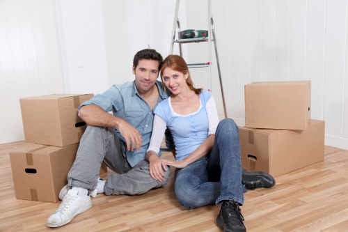 Man with a van loading furniture for a local move in Yiewsley