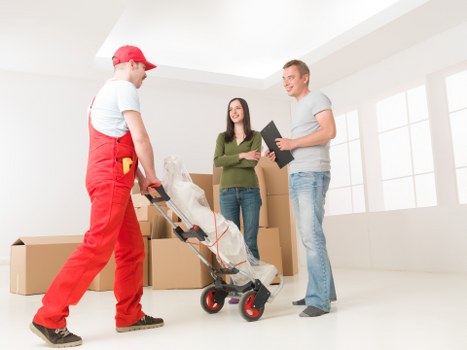 Loading furniture into a removals van in Yiewsley