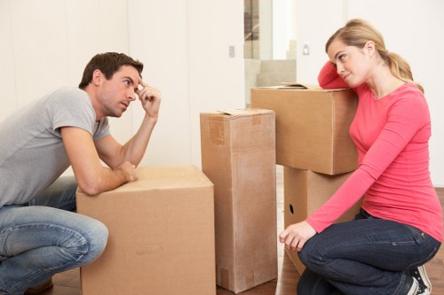 Packed boxes and wrapped household items ready for removals in Yiewsley