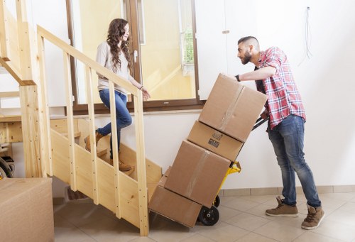 Local residents preparing belongings for a removal van move in Yiewsley